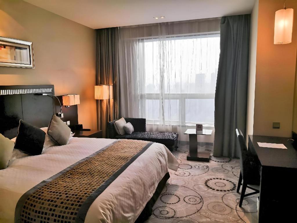 Grand Soluxe Zhongyou Hotel Шанхай Экстерьер фото