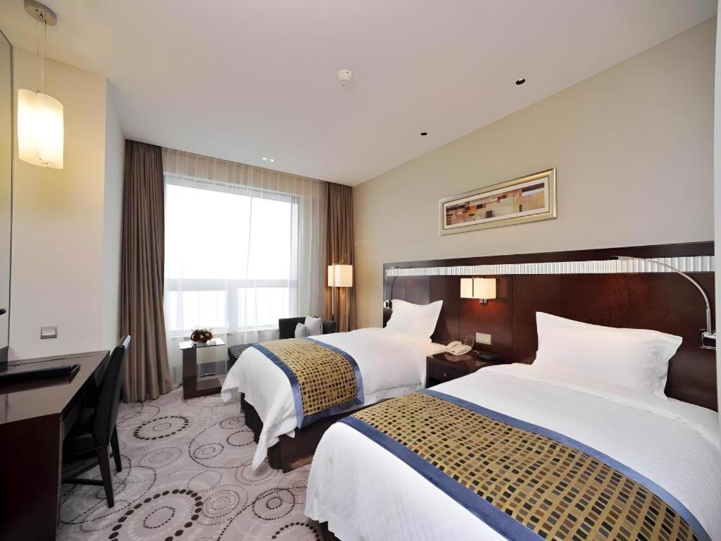 Grand Soluxe Zhongyou Hotel Шанхай Экстерьер фото